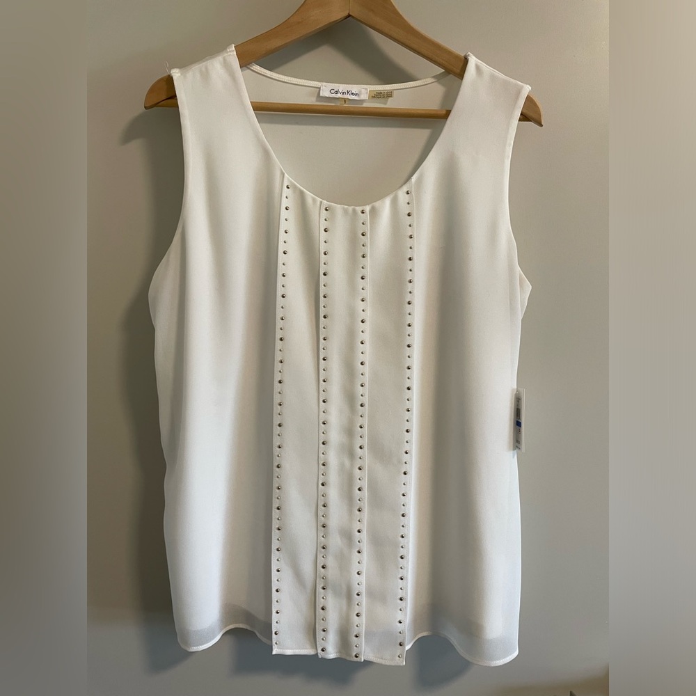 Calvin Klein tank with gold embellishment in front. Size L.